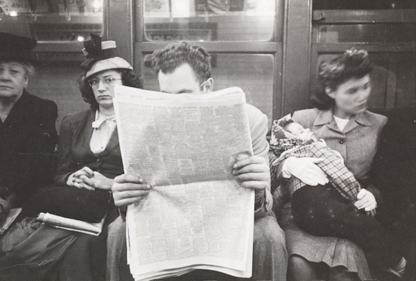 man-reading-newspaper